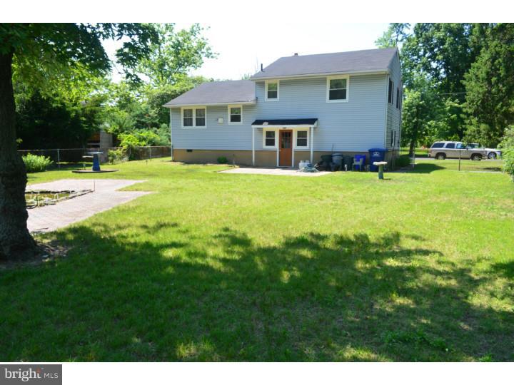 520 8 Street Riverside, NJ 08075 - Photo 13 of 14 a front view of house with yard and green space