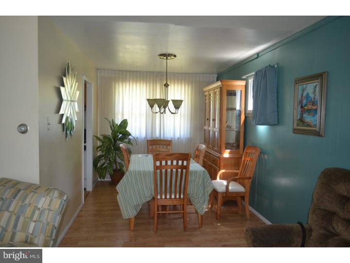 520 8 Street Riverside, NJ 08075 - Photo 5 of 14 a view of a livingroom with furniture and window
