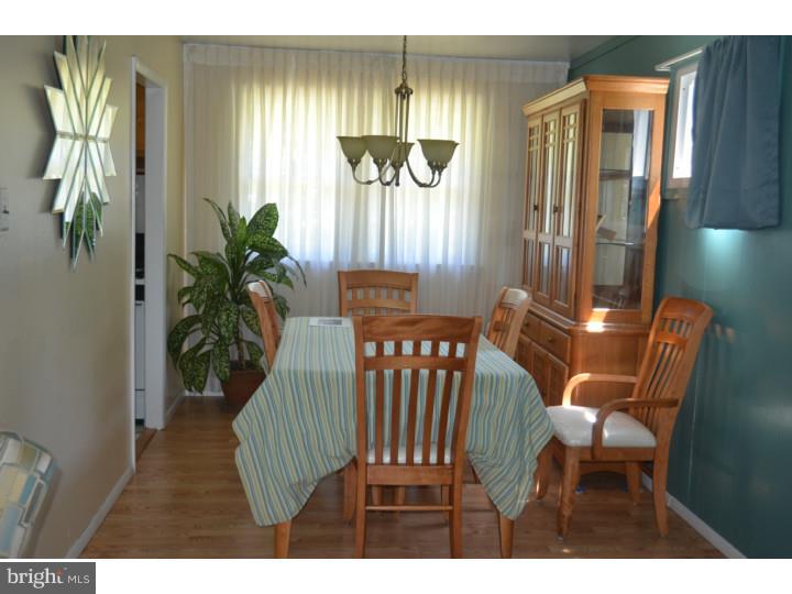 520 8 Street Riverside, NJ 08075 - Photo 6 of 14 a view of a dining room with furniture window and wooden floor