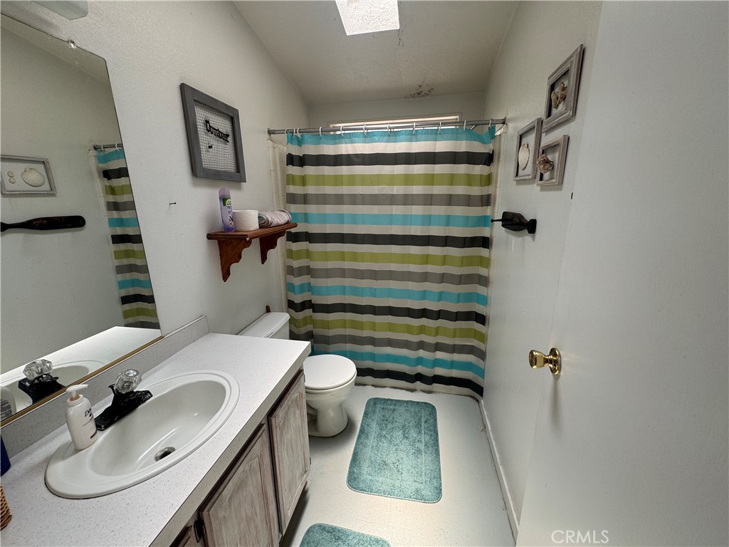 80 Rasmusen Lane Junction City, CA 96048 - Photo 17 of 67 a bathroom with a sink toilet and shower