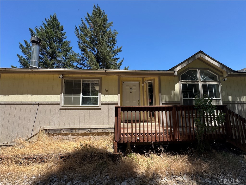 80 Rasmusen Lane Junction City, CA 96048 - Photo 2 of 67 a front view of a house with a yard