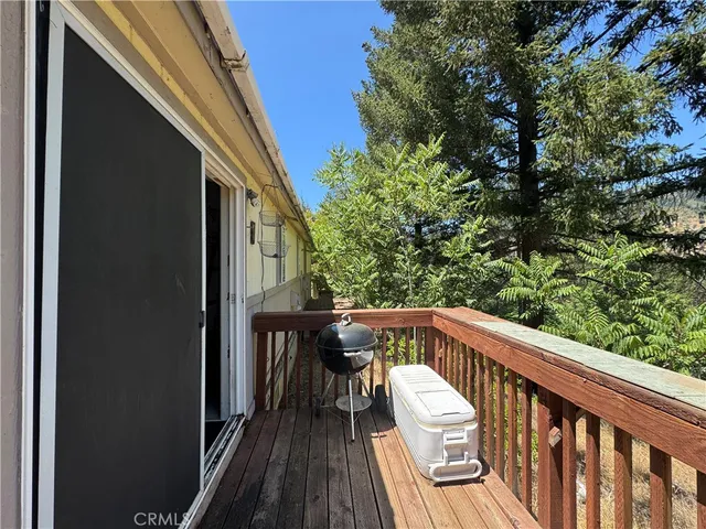 a bathroom with a sink a tub and a mirror