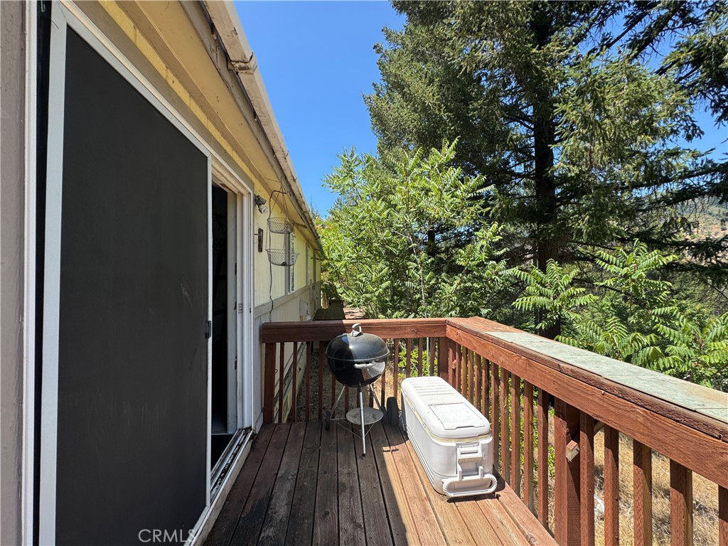 80 Rasmusen Lane Junction City, CA 96048 - Photo 28 of 67 a view of balcony with wooden floor and outdoor seating