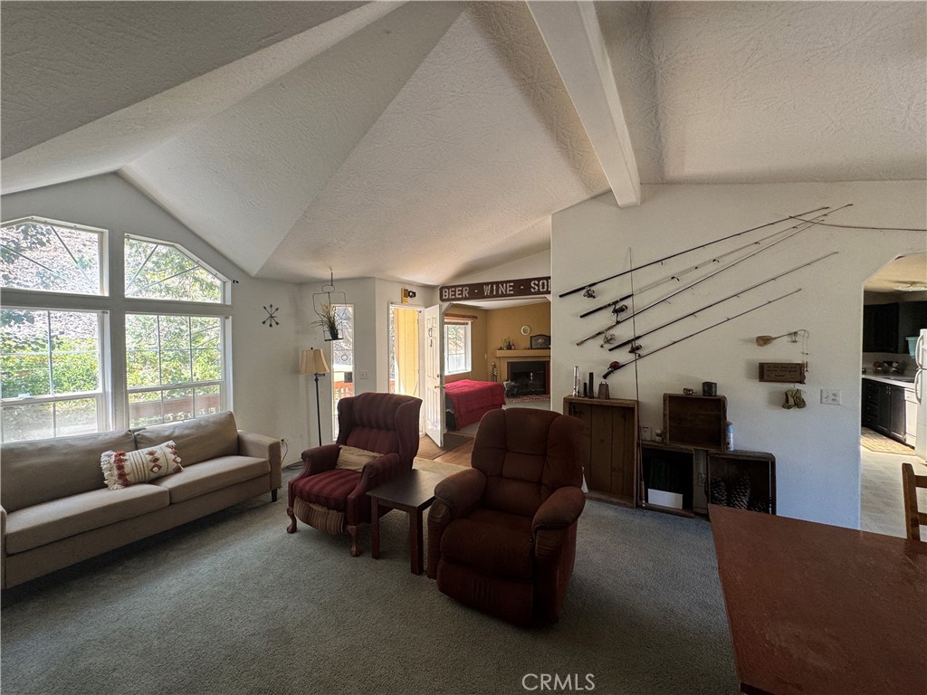 80 Rasmusen Lane Junction City, CA 96048 - Photo 31 of 67 a living room with furniture and a window