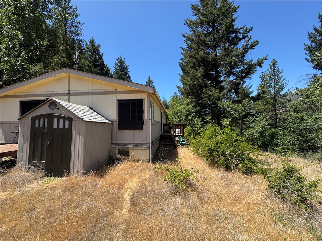 80 Rasmusen Lane Junction City, CA 96048 - Photo 39 of 67 a view of a house with a yard