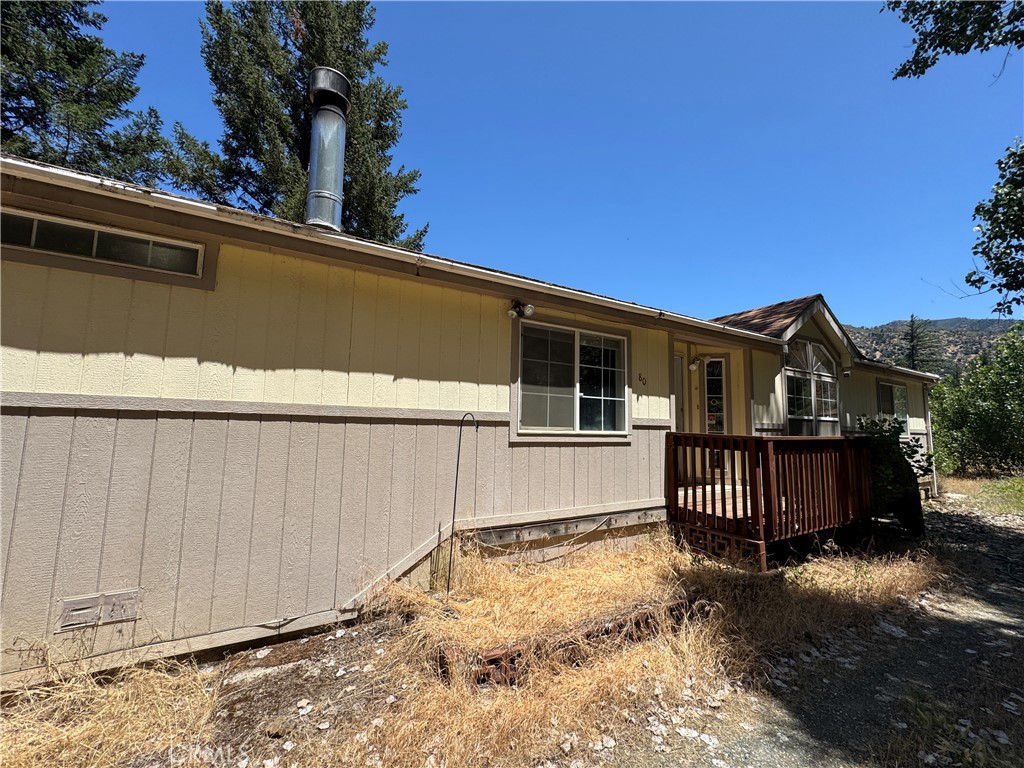 80 Rasmusen Lane Junction City, CA 96048 - Photo 4 of 67 a view of a house with a snow in the yard