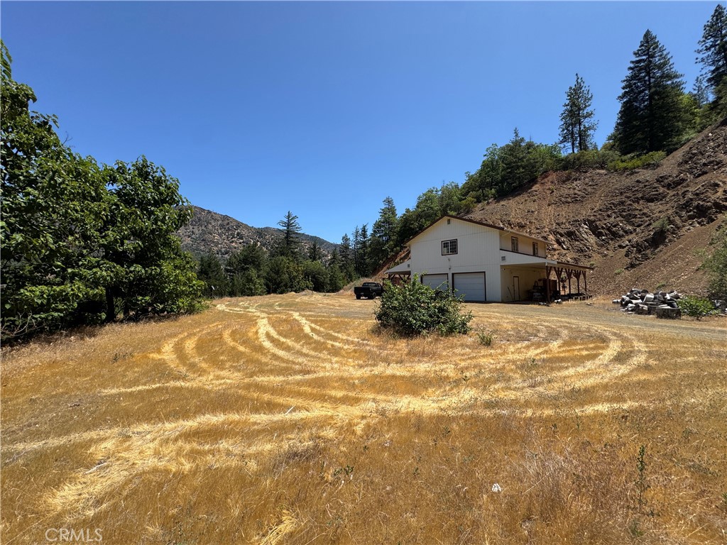 80 Rasmusen Lane Junction City, CA 96048 - Photo 43 of 67 a front view of a house with a yard