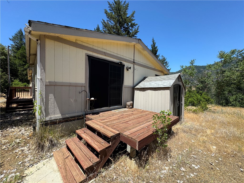 80 Rasmusen Lane Junction City, CA 96048 - Photo 6 of 67 a wooden talbe and chairs sitting in the middle of a house