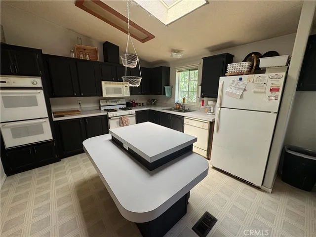 a bedroom with a bed and a fireplace