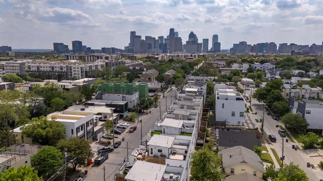 an aerial view of a city with lots of residential buildings