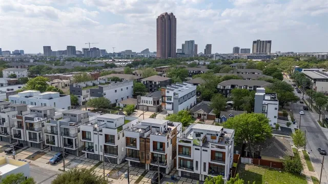 an aerial view of a city with lots of buildings
