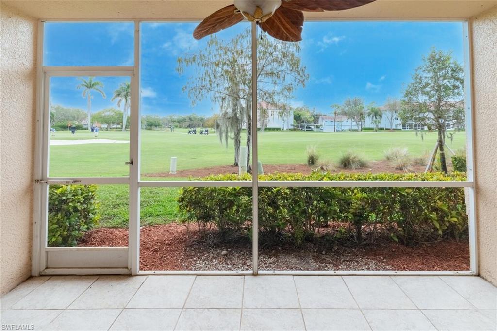 1100 Eastham Way, Unit A105 Naples, FL 34104 - Photo 18 of 27 a view of a garden from a patio