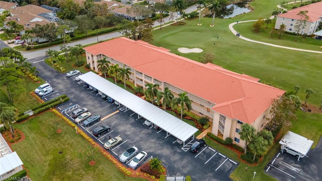 1100 Eastham Way, Unit A105 Naples, FL 34104 - Photo 21 of 27 an aerial view of a house