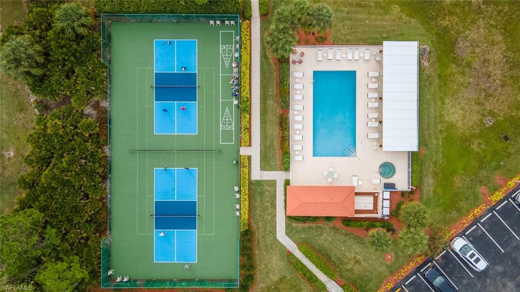 1100 Eastham Way, Unit A105 Naples, FL 34104 - Photo 22 of 27 a view of a front door of the house
