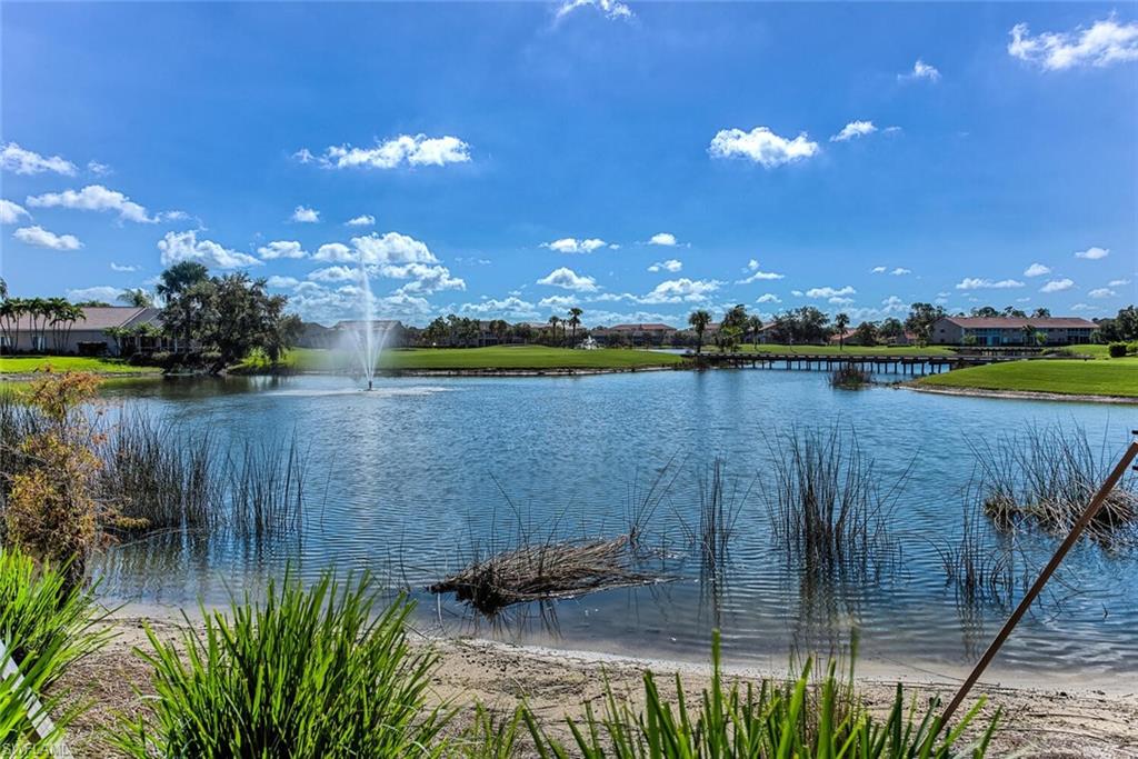 1100 Eastham Way, Unit A105 Naples, FL 34104 - Photo 26 of 27 a view of a lake in a house