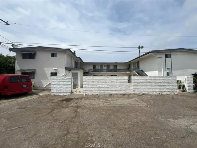 a view of car parked in front of house