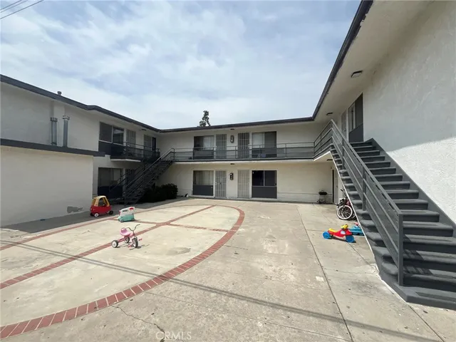 a view of a house with a terrace