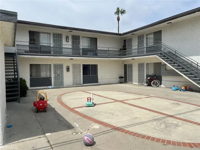swimming pool view with a seating space