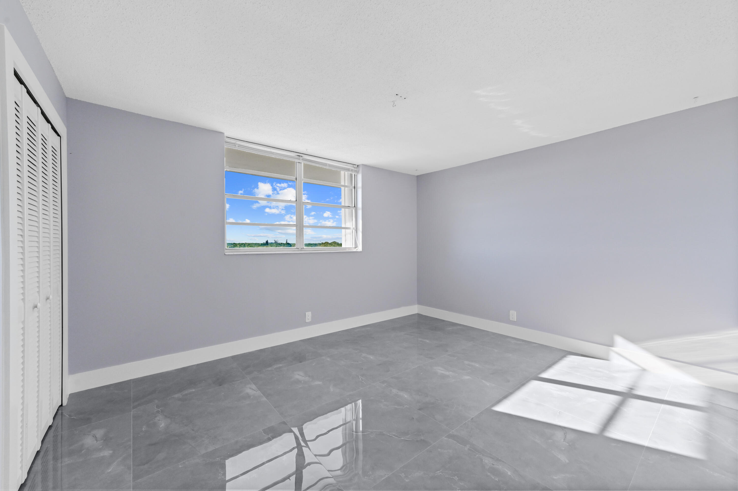 5500 Northwest 2nd Avenue, Unit 617 Boca Raton, FL 33487 - Photo 18 of 39 a view of an empty room with a window