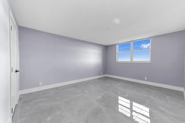 an empty room with an entryway