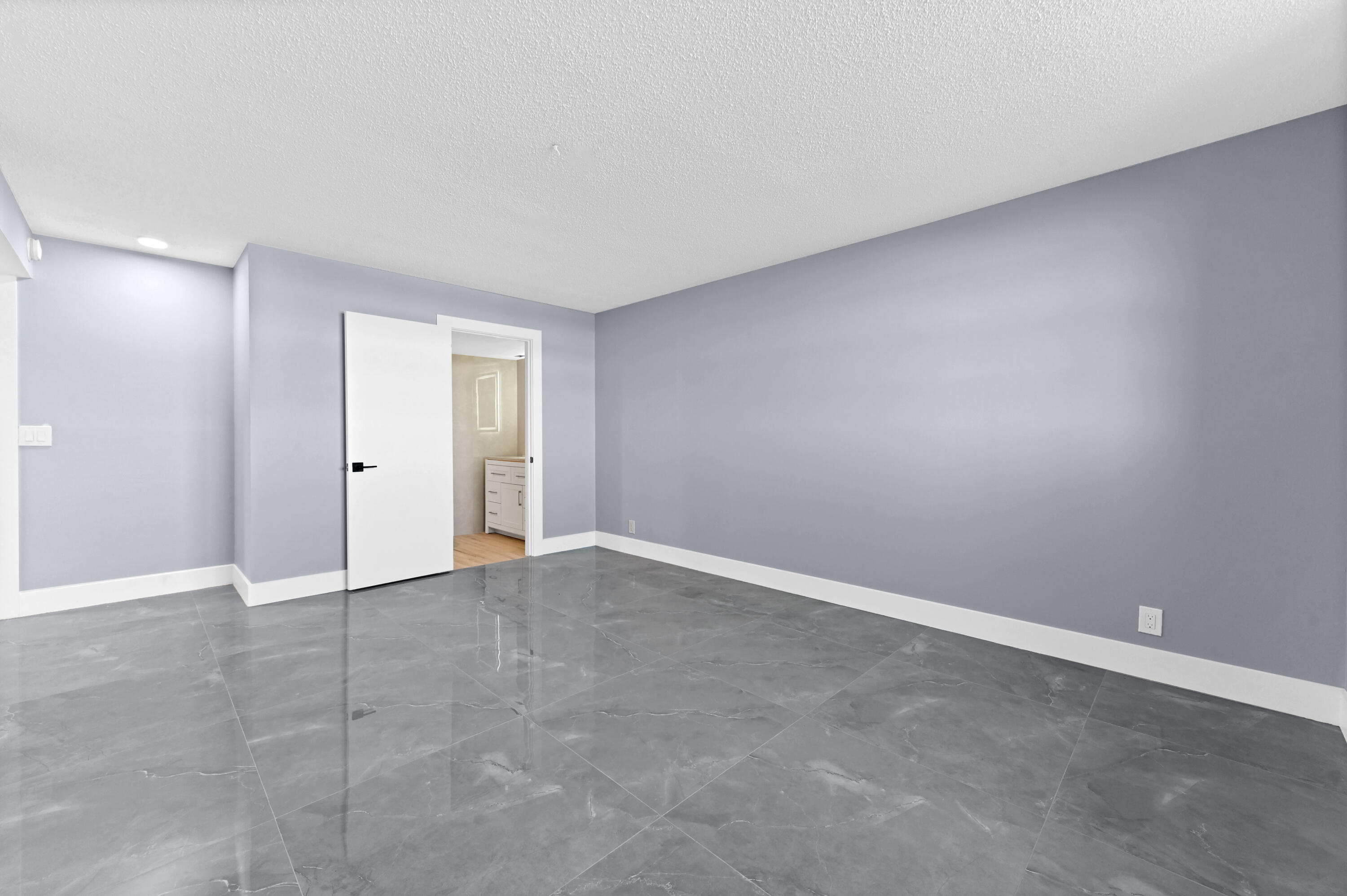 5500 Northwest 2nd Avenue, Unit 617 Boca Raton, FL 33487 - Photo 22 of 39 an empty room with an entryway