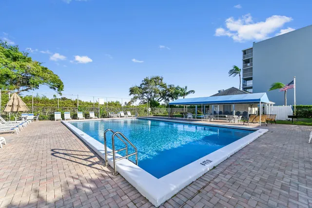 a view of a swimming pool and outdoor space