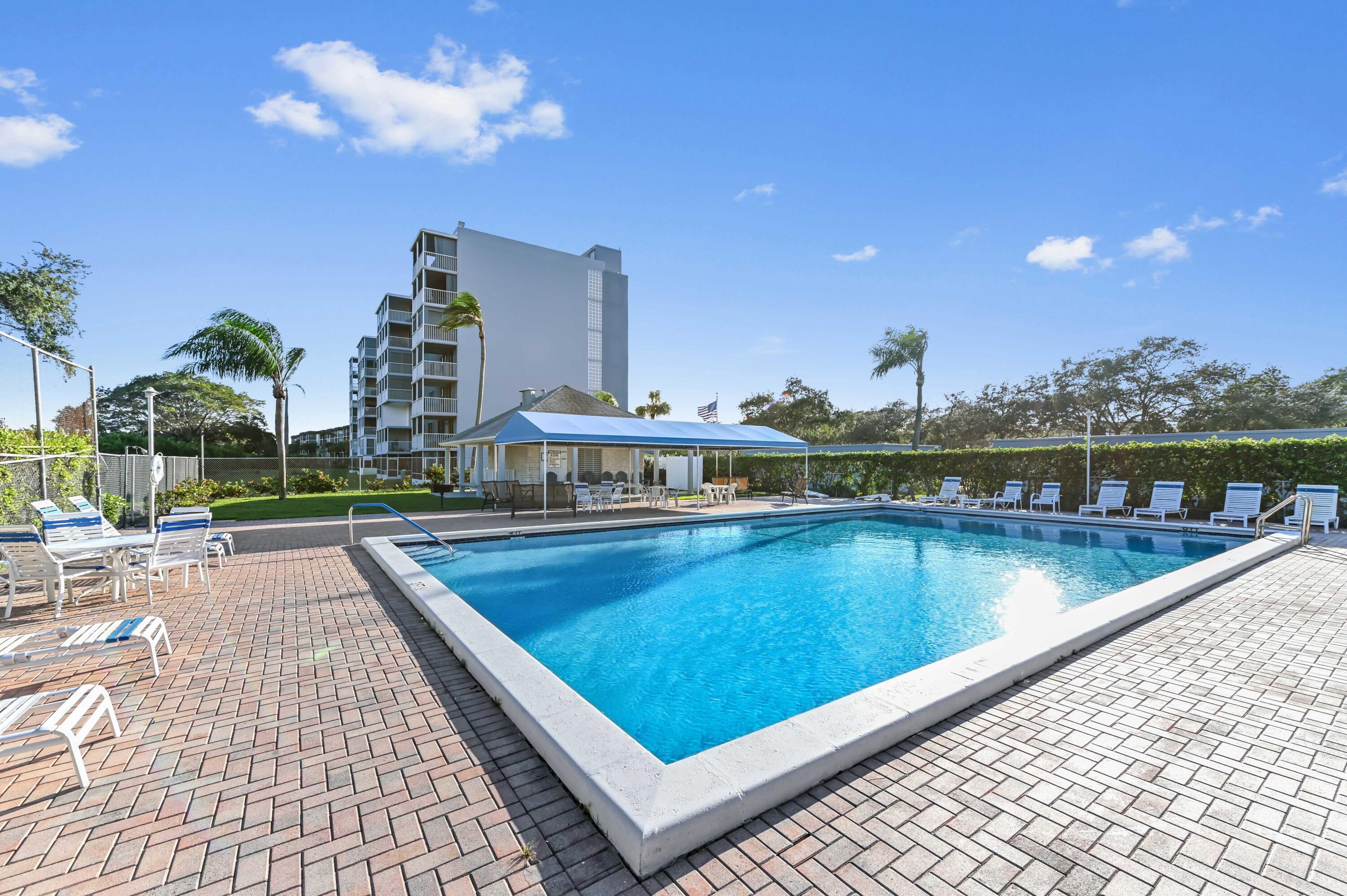 5500 Northwest 2nd Avenue, Unit 617 Boca Raton, FL 33487 - Photo 29 of 39 a view of a swimming pool and outdoor space