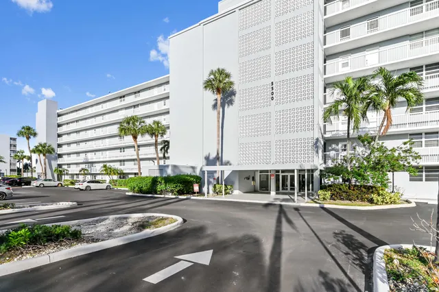 a building with trees in front of it