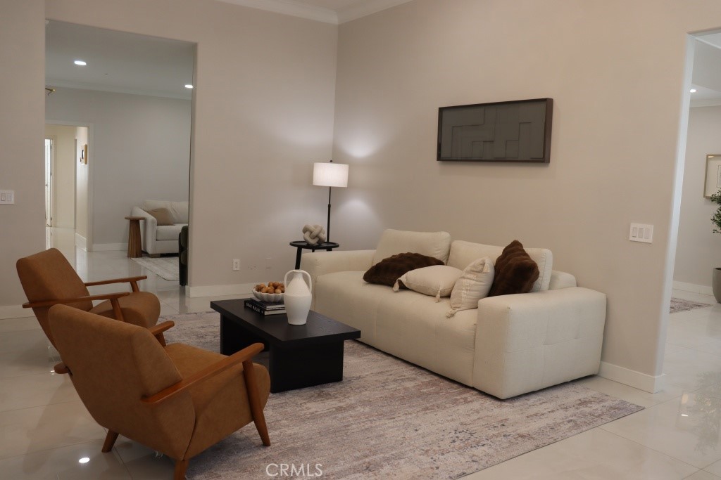 9103 Wystone Avenue Northridge, CA 91324 - Photo 15 of 59 a living room with furniture and a lamp