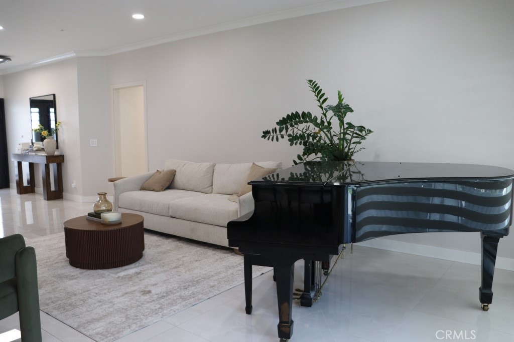 9103 Wystone Avenue Northridge, CA 91324 - Photo 19 of 59 a living room with furniture and a potted plant