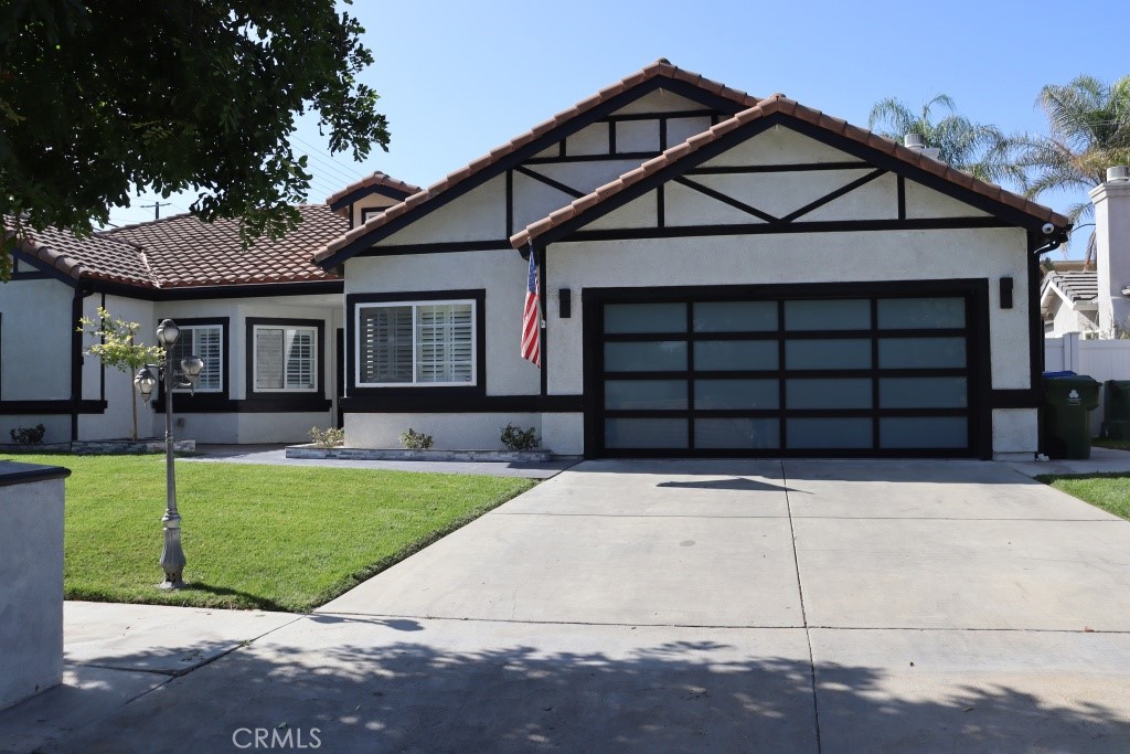 9103 Wystone Avenue Northridge, CA 91324 - Photo 2 of 59 a front view of a house with a yard