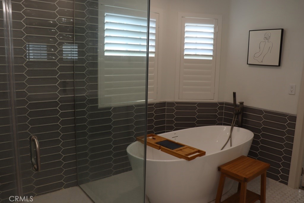 9103 Wystone Avenue Northridge, CA 91324 - Photo 26 of 59 a bathroom with a sink a toilet and a mirror