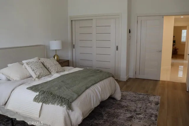a bathroom with a shower and a sink