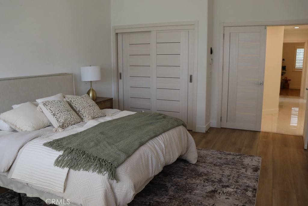 9103 Wystone Avenue Northridge, CA 91324 - Photo 28 of 59 a bedroom with a bed and closet