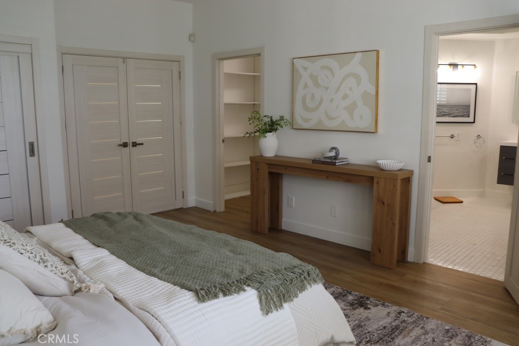 9103 Wystone Avenue Northridge, CA 91324 - Photo 29 of 59 a bedroom with a bed and a sink