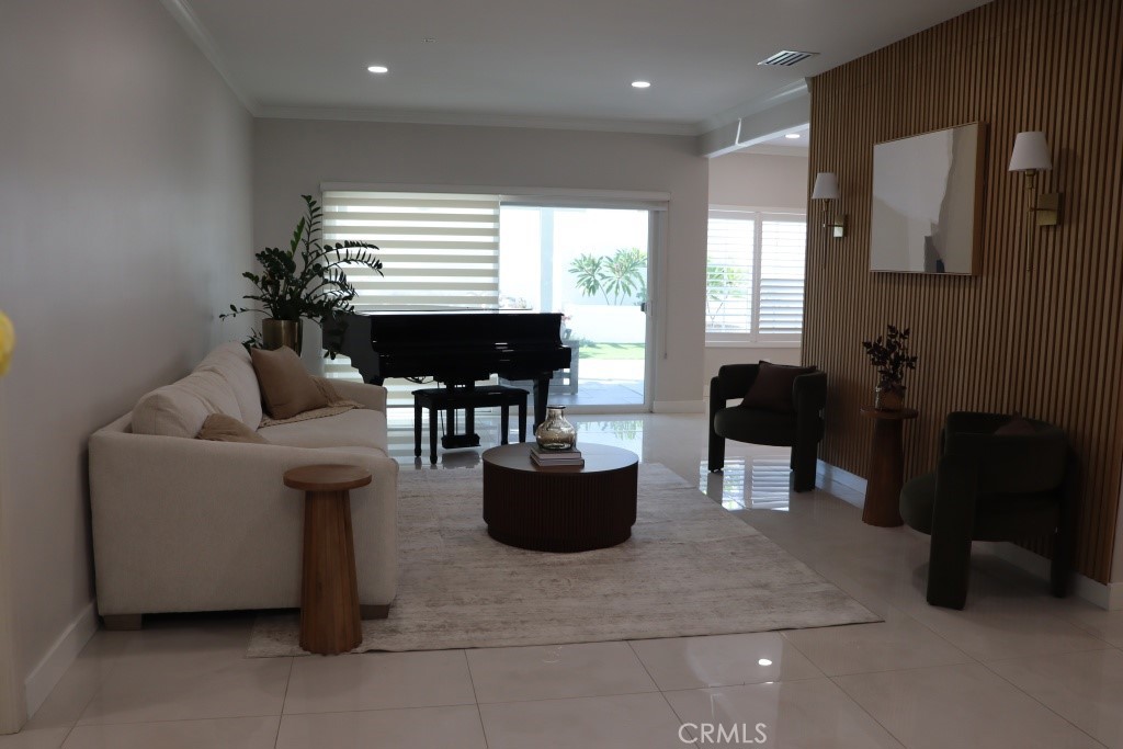 9103 Wystone Avenue Northridge, CA 91324 - Photo 40 of 59 a living room with furniture and wooden floor