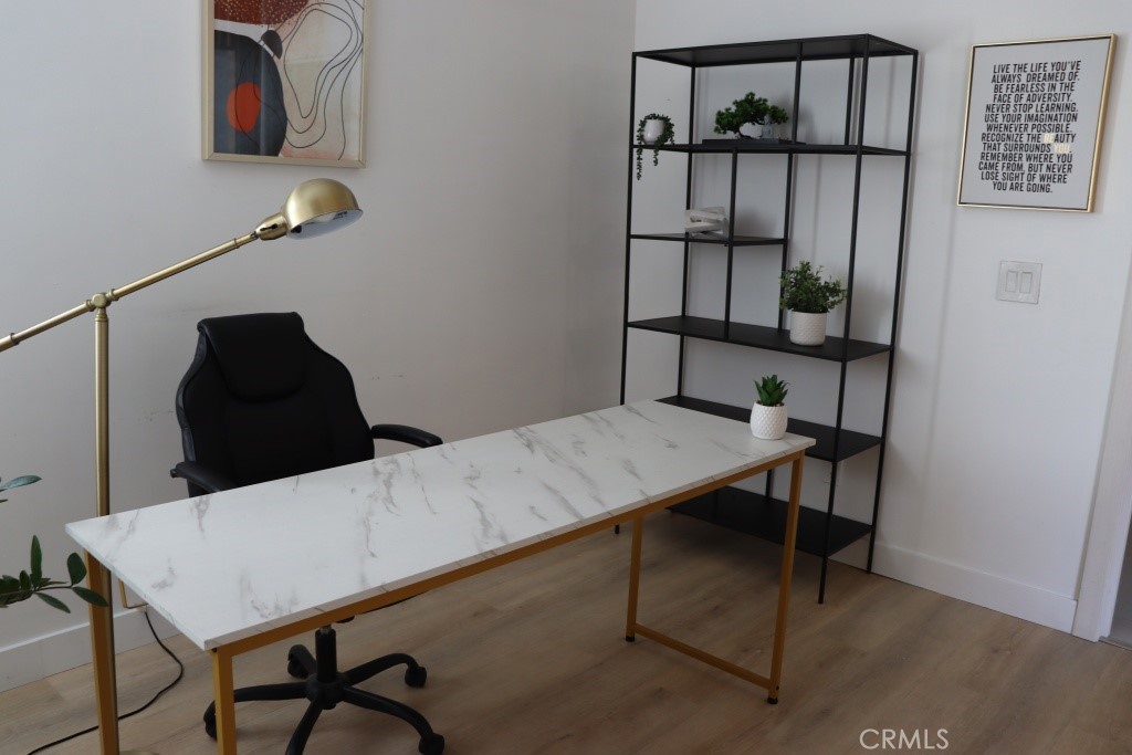 9103 Wystone Avenue Northridge, CA 91324 - Photo 44 of 59 a room that has a table and chairs in it