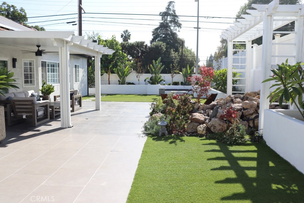 9103 Wystone Avenue Northridge, CA 91324 - Photo 48 of 59 a view of a house with backyard and sitting area