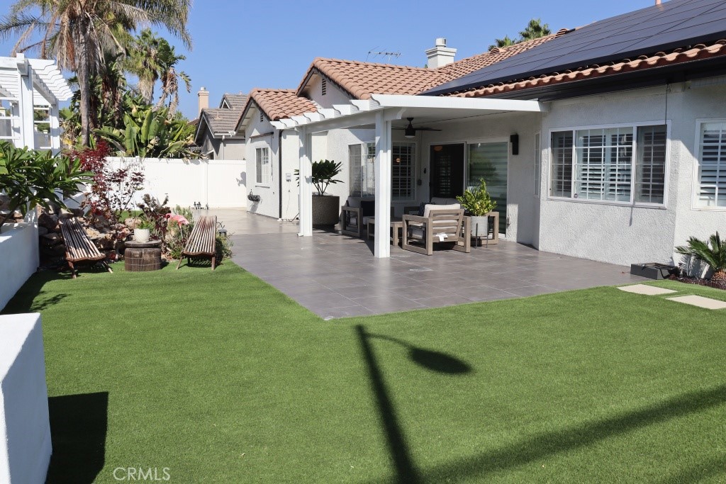 9103 Wystone Avenue Northridge, CA 91324 - Photo 52 of 59 a view of a house with backyard porch and sitting area
