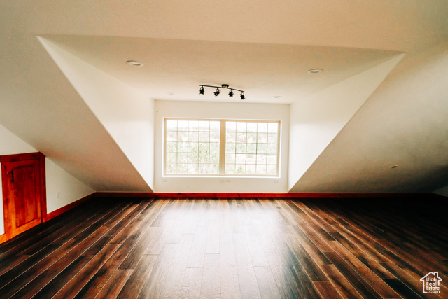 985 Russell Road Hatch, UT 84735 - Photo 22 of 30 Bonus room with baseboards and dark wood-type flooring
