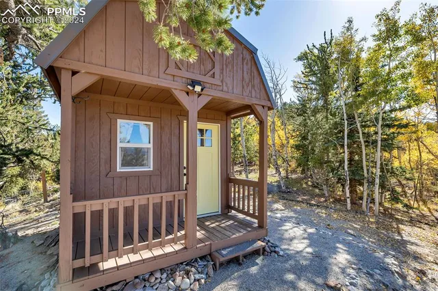 a living room with large windows
