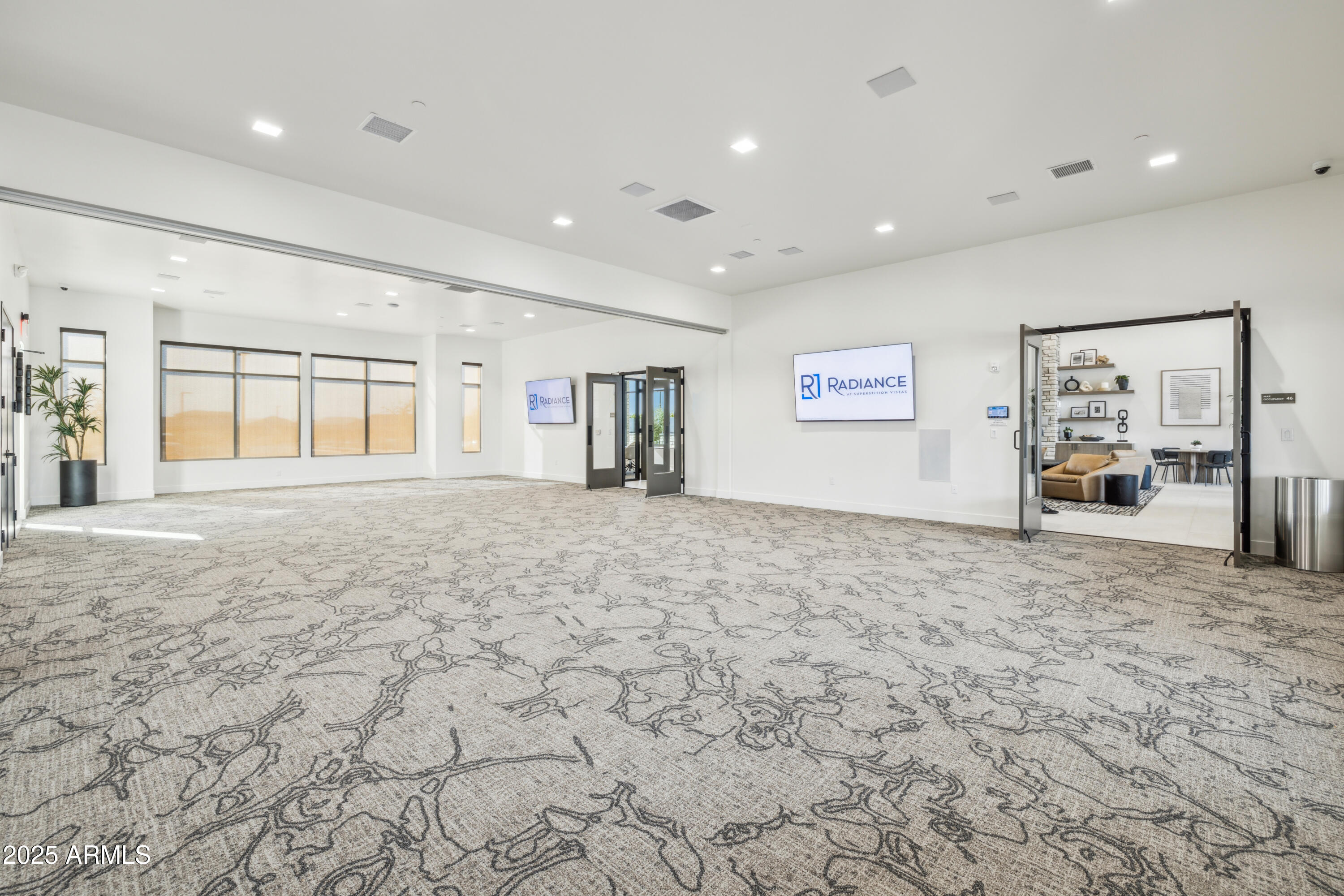 2082 West Starfire Avenue Apache Junction, AZ 85120 - Photo 33 of 35 a view of an empty room and a kitchen