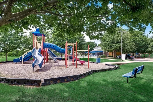 a view of a park with swings