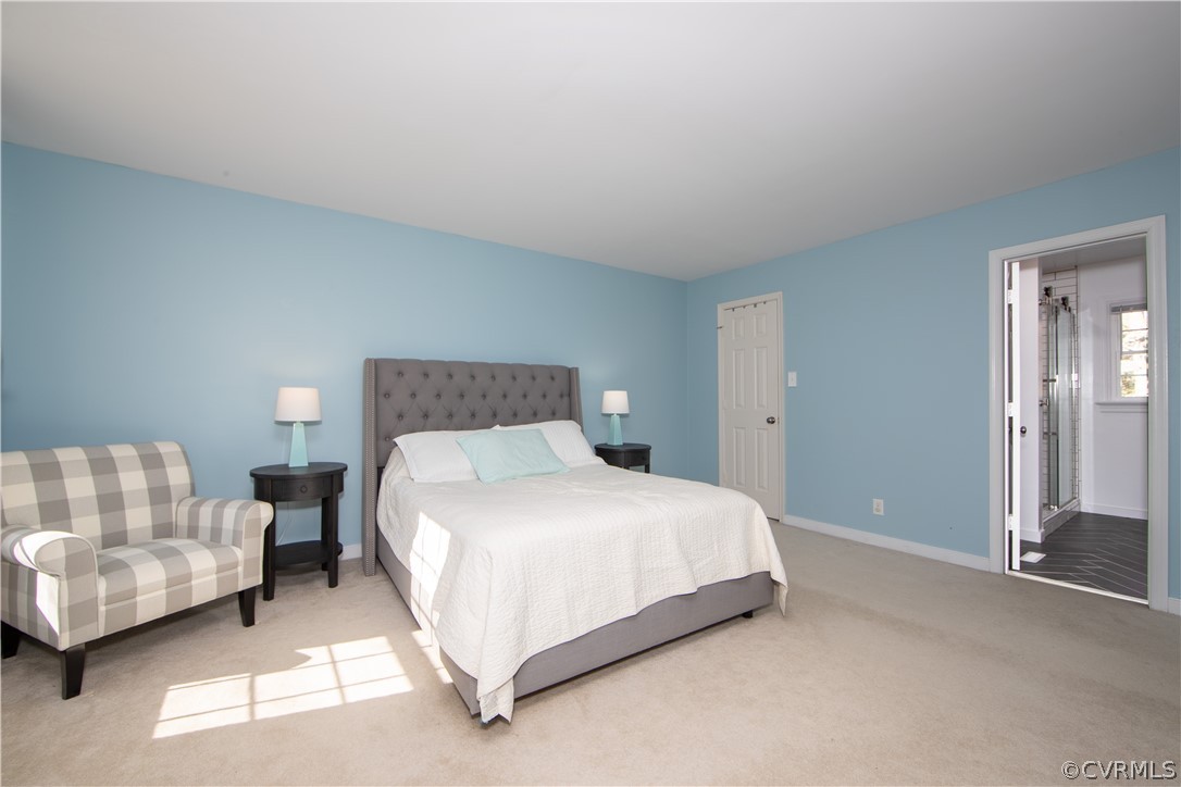 6212 Lansgate Road Midlothian, VA 23112 - Photo 15 of 26 a bedroom with bed and a couch