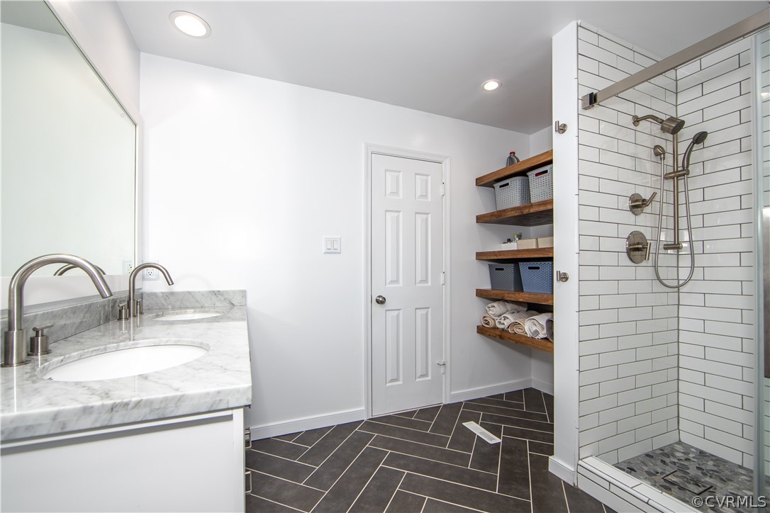 6212 Lansgate Road Midlothian, VA 23112 - Photo 16 of 26 a bathroom with a sink and a mirror