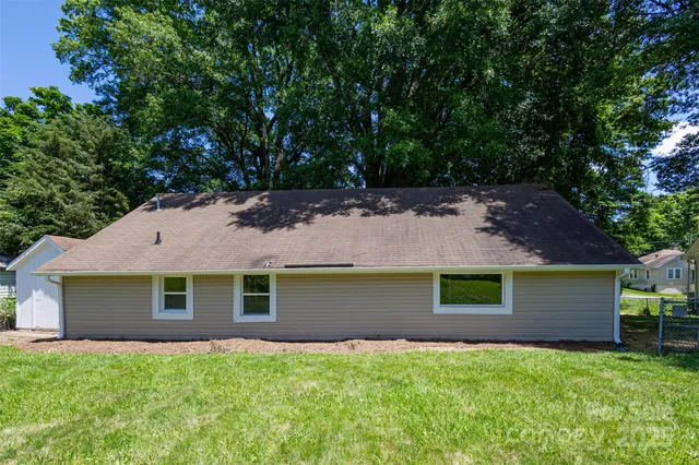a view of backyard of a house