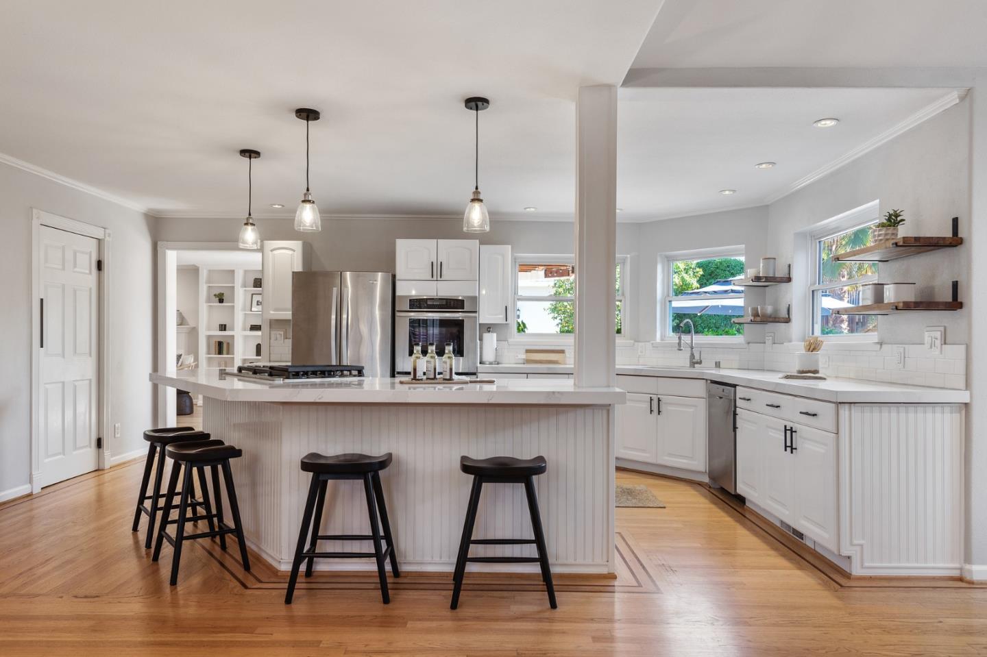 851 Almarida Drive Campbell, CA 95008 - Photo 18 of 63 a kitchen with stainless steel appliances granite countertop a kitchen island hardwood floor sink and stove