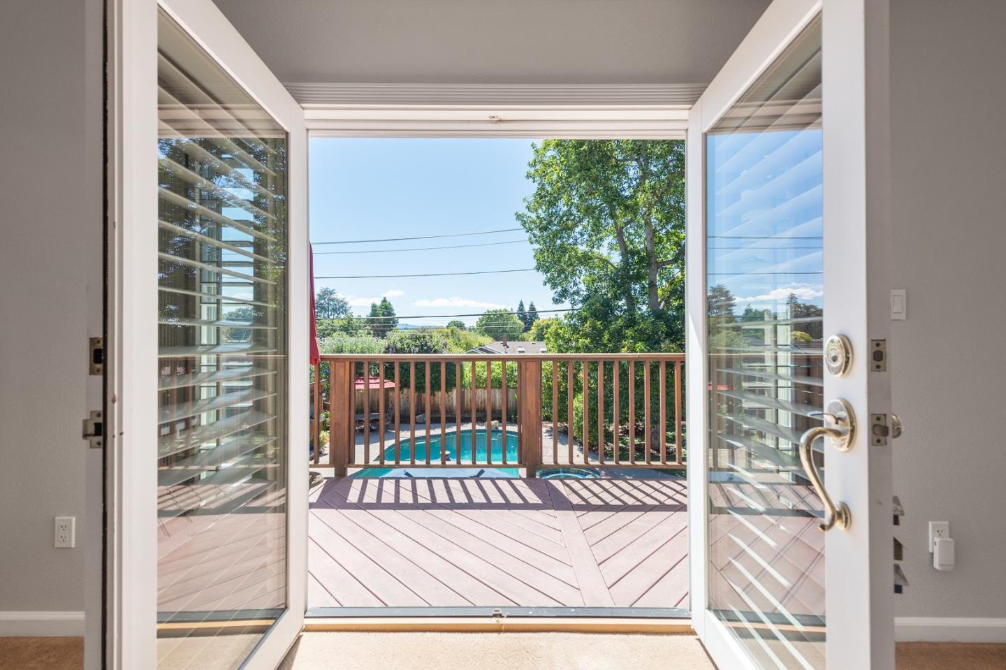 851 Almarida Drive Campbell, CA 95008 - Photo 34 of 63 a view of a balcony with a floor to ceiling window