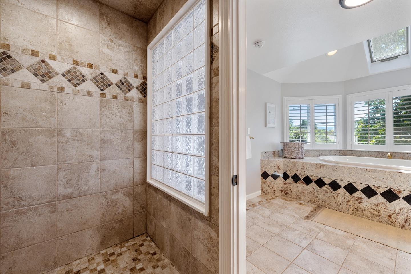 851 Almarida Drive Campbell, CA 95008 - Photo 43 of 63 a bathroom with a bathtub and shower
