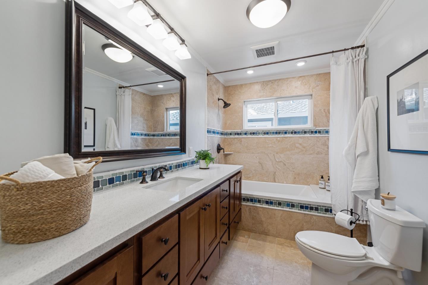 851 Almarida Drive Campbell, CA 95008 - Photo 46 of 63 a bathroom with a double vanity sink and a mirror